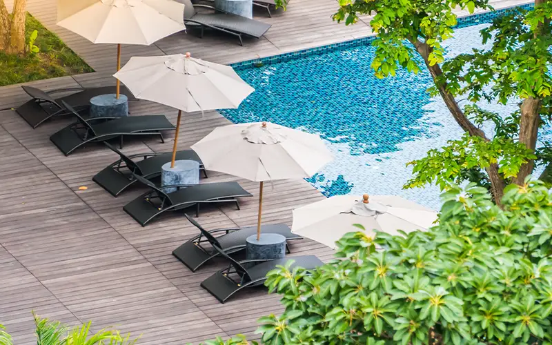 Commercial pool area with lounge seating supported by professional pool cleaning and maintenance services in Scottsdale and Mesa