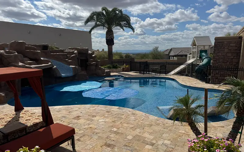 Clear blue swimming pool after professional algae removal and green pool cleaning service in Scottsdale and Mesa Arizona