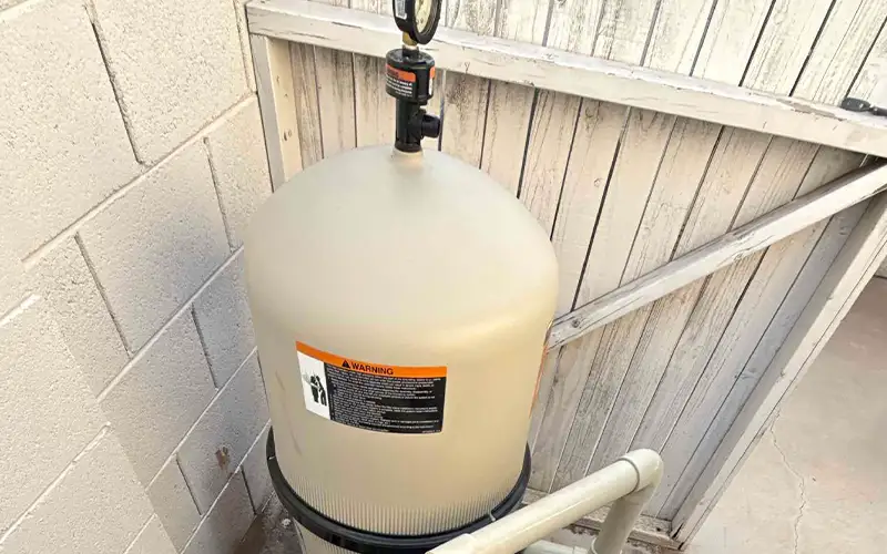 Pool filter system inspection during professional filter cleaning service in Scottsdale and Mesa Arizona