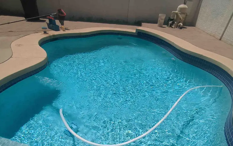 Clear residential swimming pool after routine maintenance service in Scottsdale and Mesa Arizona