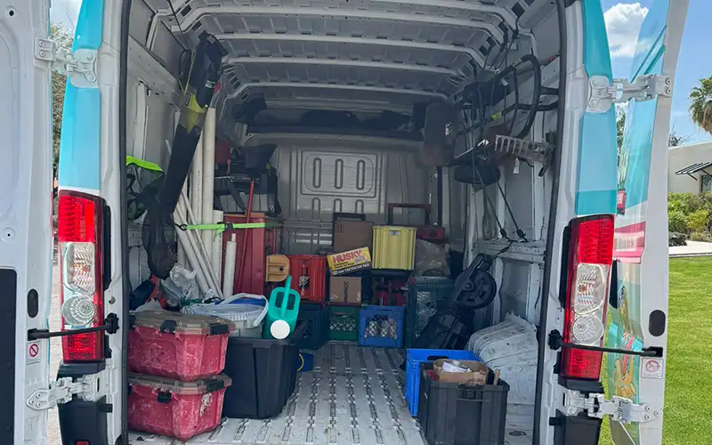 Pool service technician equipment and maintenance tools stored in service van for preventative pool maintenance in Scottsdale Mesa Arizona